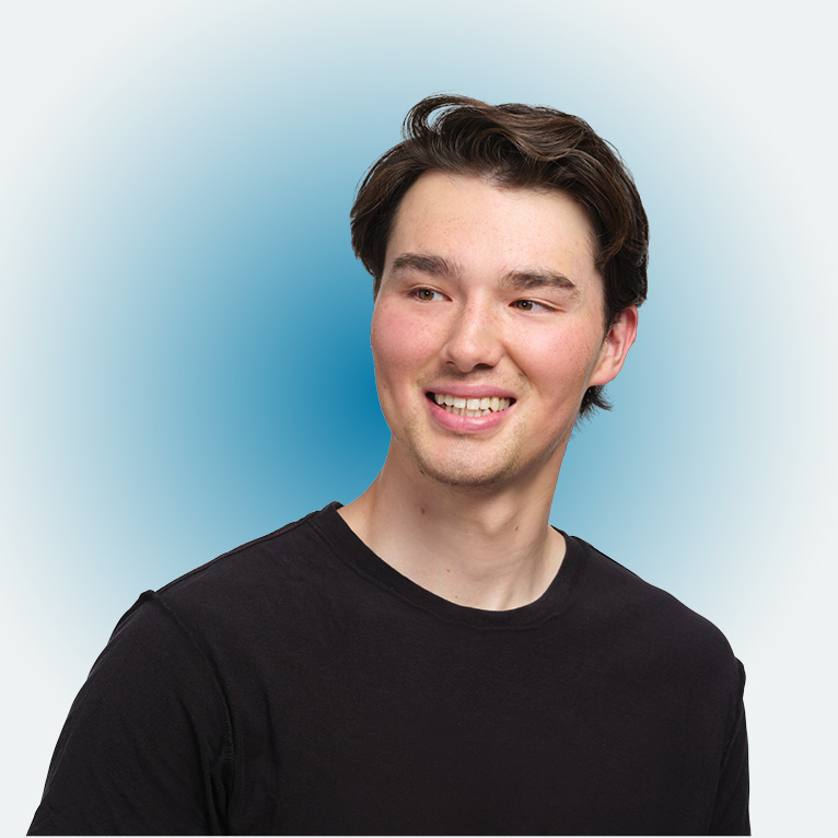 Cropped photo of LMU graduate Noah Kim, class of 2024, smiling on a white background.